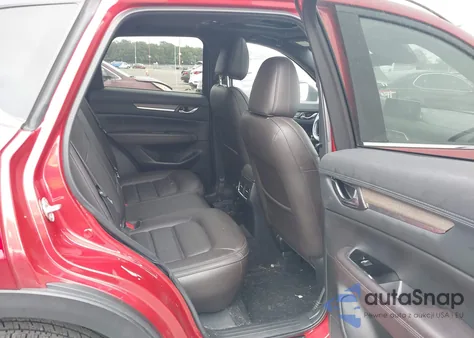 2021 Mazda Cx-5 Signature z USA, uszkodzony, nr VIN JM3KFBEY6M0430937